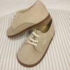 Zapatito tipo blucher de cordones de piel serraje