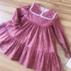 Blanca Valiente vestido rojo flores